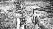 Mervyn Upham, R.C. Hart and Franc Joubin watch the construction of the headframe and mill building of the Quirke uranium mine near Elliot Lake, Ont., in the late spring of 1955.