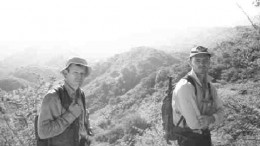 Jock Slater, chief geologist (left), and Bruce Smith, project geologist, in front of the Escondida prospect at the El Tambor project, 50 km north of Guatemala City, Guatemala.