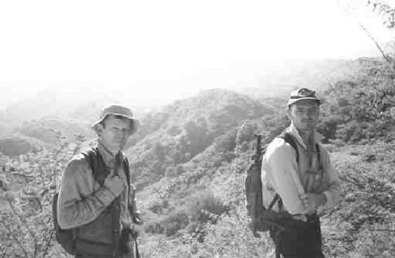 Jock Slater, chief geologist (left), and Bruce Smith, project geologist, in front of the Escondida prospect at the El Tambor project, 50 km north of Guatemala City, Guatemala.