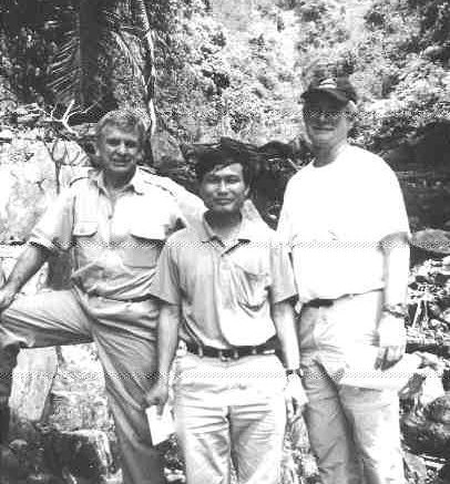 Terry Bates (left), managing director of AMR, analyst James Mustard (right) and a Vietnamese geologist examine the King Snake zone.