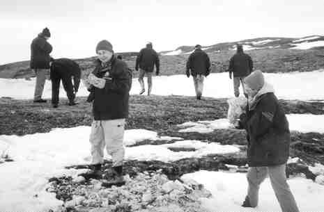 Mining analysts examine outcrops at the Hope Bay project in Nunavut.