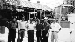 Gathered in front of BacTech's pilot plant are (left to right): Arturo Vaca of Peoles, analyst Ed Flood, Ricardo Benavides Perez of Peoles, BacTech President Geoffrey Donohue, consultant Michael Rhodes, and director Ross Orr.