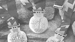 The silver (left), gold and bronze medals made for the 2002 Olympic Winter Games in Salt Lake City, Utah. Each medal consists of metals mined from the Kennecott Utah Copper mine in Salt Lake Valley.