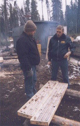 Southern Rio Resources President Lindsay Bottomer (right) talks with Vancouver-based newsletter writer David Coffin. A drill turns on the Ted vein in the background.