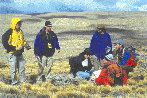 At IMA Exploration's Navidad property in Argentina's Patagonia region, from left: Douglas Leishman, senior vice-president of Endeavour Financial; Rob Robertson, associate editor of The Northern Miner; Don Poirier analyst with First Associates Investments; Doug Hurst, analyst with Pacific International Securities; Paul Lhotka, IMA geologist (sitting, red jacket); and Keith Patterson, IMA exploration manager.