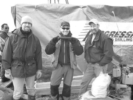 At the Churchill project in Nunavut, Sean Hawkes (left, in front), a first-aid attendant with 1984 Enterprises, stands beside Chris Raffle, a geologist with Texas-based APEX Geoscience, and Robert Woodhead, a pilot with Great Slave Helicopters.