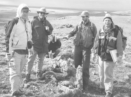 Examining a bonanza silver structure at IMA Exploration's Navidad property in Argentina. From left: Douglas Leishman, analyst; Douglas Hurst, analyst; Donald Poirier, analyst; Keith Patterson, IMA's exploration manager; and Paul Lhotka, geological consultant.