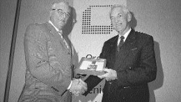 Gatan Lefebvre (left), president of the Order of Engineers of Quebec, presents Ren Dufour with the order's 2003 Excellence Award.