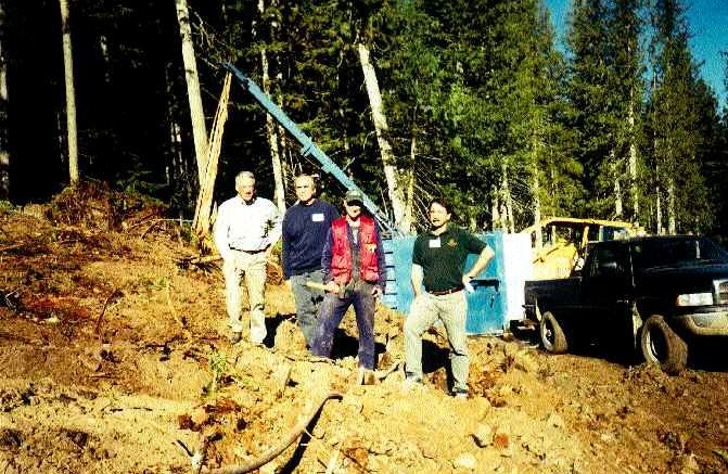 Imperial Metal's Mount Polley team stands on the newly discovered Northeast zone. From left: Pierre Lebel, chairman; Art Frye, senior mine engineer; Patrick McAndless, VP exploration; Brian Kynoch, president.