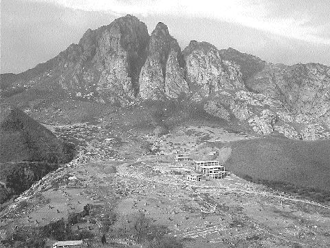 A view of the Zone 1 area at the Maoling gold prospect in China, in which Mundoro Mining can earn a 79% interest. The buildings in the foreground are the beginnings of a plant facility started by the Chinese before Mundoro's involvement.