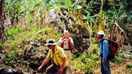 Radius Gold President Simon Ridgway (centre) and analyst Brent Cook (left) examine silicified boulders at the Pavon North vein in Nicaragua.
