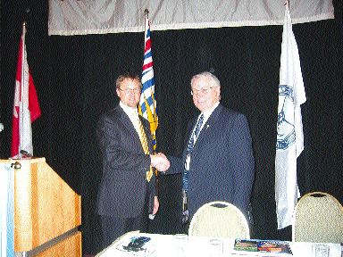 Photo by Stephen StakiwMichael Gray (left), president of the British Columbia & Yukon Chamber of Mines, with the province's mines minister, Richard Neufeld, at the opening ceremony of the 2005 Mineral Exploration Roundup in Vancouver.