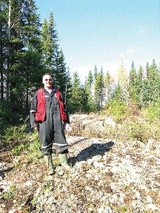 Golden Valley Mines' Senior Geologist Michael Rosetelli on one of the company's claims near Val d'Or, Que.