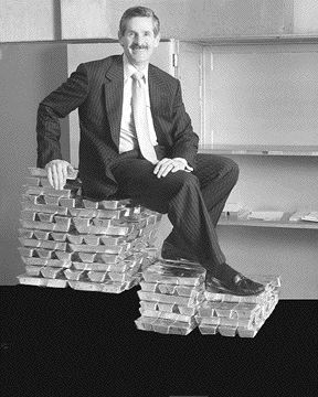 Modern-day Midas Robert McEwen, chairman and CEO of Goldcorp, seated on a portion of the company's gold inventory in February 2005.