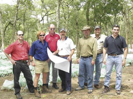 Photo by Pattie BealesEquinox Minerals personnel at the Mulandwe RC sample farm, from left: Kevin van Niekerk, vice-president investor relations and corporate development; Greg Winch, chief exploration geologist; Bruce Nisbet, vice-president exploration; Michael Richards, exploration manager for Africa; Craig Williams, president; Noel McNee, Lumwana site operations and technical manager; and Harry Michael, chief operating officer.