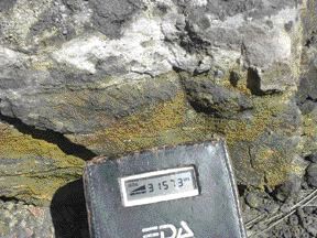 A geiger counter tests uranium mineralization at the Velvet mine in Utah.