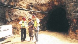 From left: Genco President Jim McDonald, Chief Geologist Jesus Perez, and financier Robert Blankstein examine a map near a portal at Genco's La Guitarra silver-gold mine in the Temascaltepec mining district of Mexico.