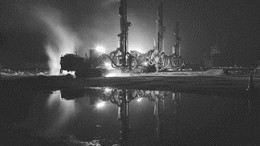 Geologist Arnand Van Heerden submitted Earth Breaking Reflection, a photo depicting three drills working under moonlight at Gold Field's Tarkwa gold mine in Ghana. The photo was awarded second prize.