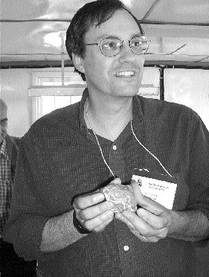 Photo by Sarah HurstPaul Layer, a geologist at the University of Alaska Fairbanks, holds a 1.2-kg platinum nugget recovered by KoryakGeoldobycha in June.