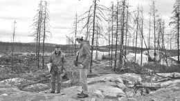 Andr Gaumond, president and CEO of Virginia Gold Mines, shows a gold analyst around the lonore gold property in Quebec's James Bay region during the summer of 2005.