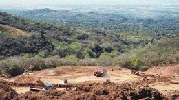 Workers prepare the heap-leach pad at Glencairn Gold's Bellavista gold mine in Costa Rica, now in commercial production.