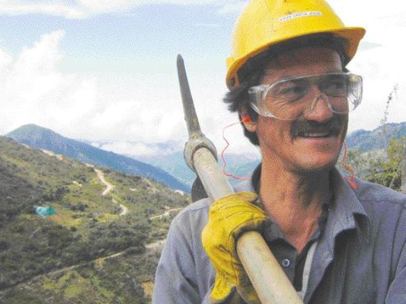 A worker holds a mattock at Greystar Resources' 10-million-oz. Angostura gold property near Bucaramanga, in Santander department, Colombia.