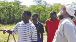 ANTHONY VACCARORockover Resources project manager Luckson Manda (far left) with SouthernEra project manager Paul Allan (far right). The two companies are partners on the Tsholotsho diamond project in Zimbabwe.