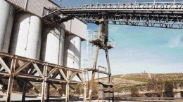 JOHN CUMMINGThe Aguas Teidas mine site includes well-maintained offices and maintenance sheds, an operating mine-water treatment plant, a 300-tonne-per-hour primary crusher and these four 400-tonne ore-storage bins.