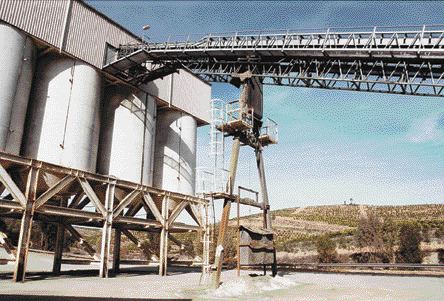 JOHN CUMMINGThe Aguas Teidas mine site includes well-maintained offices and maintenance sheds, an operating mine-water treatment plant, a 300-tonne-per-hour primary crusher and these four 400-tonne ore-storage bins.