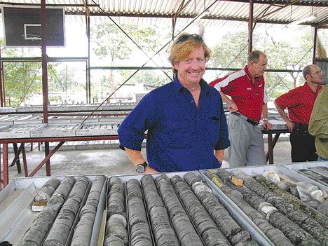 TNM ARCHIVESEquinox Minerals' chief exploration geologist Greg Winch stands with core from the Chimiwungo deposit in Zambia. Chimiwungo is one of two pits -- Malundwe being the other -- that make up the Lumwana copper project.