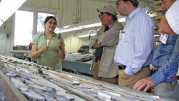 BY RYAN WALKERAlexis Minerals geologist Sophie Lafontaine discusses core from the Louvex VMS project, near the Louvicourt copper-zinc mine, not far from Val d'Or, Que.