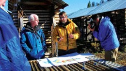 VIVIAN DANIELSONWestern Keltic Mines' vice-president of exploration, Peter Holbek (centre, yellow), explains the geology of the Kutcho Creek massive sulphide project during a site visit to Dease Lake, northern B.C.