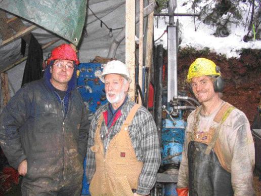 Taking a break from drilling on the East Emerald zone at Sultan Minerals' Jersey Emerald property in southeastern British Columbia. From left: Richard Lawrick of Prospector Diamond Drilling, Sultan project manager Ed Lawrence, and driller's helper David Little.