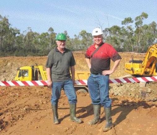 ALISHA HIYATEIberian Minerals chairman and vice-president of exploration, Norm Brewster (left), and Jim Voisin, the company's investor relations officer, stand in front of a mine ramp portal under construction at Aguas Tenidas, in Andalucia. The company, which is aiming for a mid-2008 reopening, expects to employ about 560 workers during the construction stage, and 310 once operations begin in the economically depressed area of Spain.