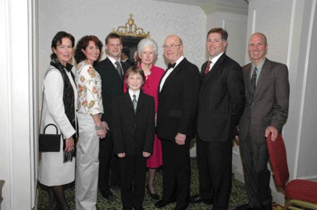 KEITH HOUGHTON PHOTOGRAPHYNewsletter writer and inductee George Cross (centre, in tuxedo) with his family.