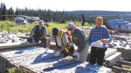 BY STEPHEN STAKIWFrom left: Aurora Energy's vice-president of exploration Ian Cunningham-Dunlop, chief geoscientist Rick Valenta, and mining analysts Glenn Brown and Jay Turner examine drill core at the Michelin deposit, situated in coastal Labrador's Central Mineral Belt.