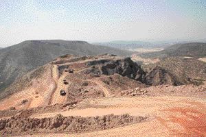 Trucks carry ore at Metallica's Cerro San Pedro gold-silver project in Mexico.