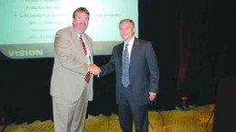 Meridian Gold president and CEO, Ed Dowling (left), and Yamana Gold chairman and CEO Peter Marrone shake hands in Denver's Hyatt Regency Hotel after reaching an agreement on Yamana's increased takeover offer.