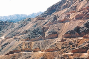 A drill rig is dwarfed in the road on the Gazelle zone at Centamin Egypt's Sukari project, in Egypt.