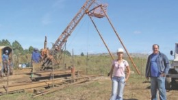 Amarillo Gold geologist Lillian Silva and field assistant Tiago Goulart at a drill rig at the company's Lavras Do Sul project, in southern Brazil.