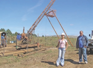 Amarillo Gold geologist Lillian Silva and field assistant Tiago Goulart at a drill rig at the company's Lavras Do Sul project, in southern Brazil.