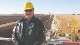 Sanjdorj Samand, vice-president of Ivanhoe Mines and Rio Tinto's Oyu Tolgoi copper-gold project, in Mongolia, stands at the collar to shaft 2.