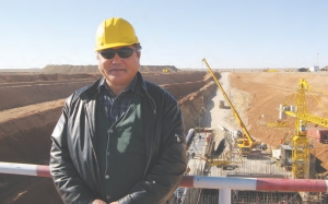 Sanjdorj Samand, vice-president of Ivanhoe Mines and Rio Tinto's Oyu Tolgoi copper-gold project, in Mongolia, stands at the collar to shaft 2.