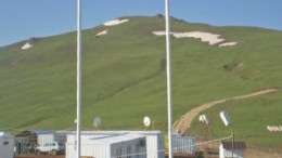 The flags of Armenia and the United Kingdom fly side by side at Lydian International's Amulsar gold project, in Armenia. The company's "first mover" strategy has also taken it to Kosovo, once one of Europe's largest zinc-producing areas.