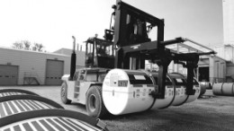 A forklift loads a uranium hexafluoride (UF6) cylinder for shipping at Cameco's Port Hope, Ont., plant. The company's supplier of hydrofluoric acid has terminated its contract, leaving Cameco without the key ingredient needed to make UF6.