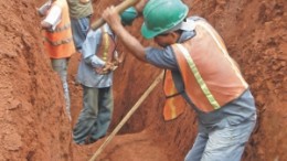 Workers dig out the foundation for the mill at Infinito Gold's Crucitas gold mine, in Costa Rica. The site will host a conventional carbon-in-leach plant that is expected to yield 96% gold recovery from near-surface saprolite and 92% recovery from the deeper hard rock.