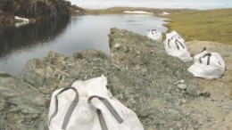 Megabags surround the AV1 outcrop at Stornoway Diamond's Aviat project, on the Melville Peninsula in Nunavut, last summer. A total of 49 tonnes of kimberlite were extracted from AV1 and processed by dense media separation, returning 43.41 carats of diamonds, or 89 carats per hundred tonnes.