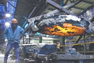 Ferromolybdenum smelting at Thompson Creek Metals' Langeloth metallurgical facility, 40 km west of Pittsburgh, Penn. Langeloth has a roasting capacity of 35 million lbs. of molybdenum per year.