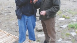 Golden Band Resources chairman Ron Netolitzky (left) and president and CEO Rodney Orr examine drill core from the company's Bingo gold deposit in north-central Saskatchewan.