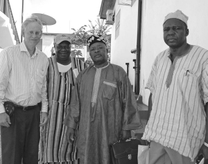 From left: Richard Redfern, president of Mexivada Mining, poses with Chief S. M. Gborie and two other chiefs from the Gbense Chiefdom, outside of Mexivada's Yaradu, Sierra Leone, headquarters. The Gbense Chiefdom will earn a 30% share of the net profit of diamonds found by Mexivada in the area. Inset: Artisanal miners employed by Mexivada's local partner Pink Diamond Exploration use a Hartz Jig for diamond concentrating at North Kono, Sierra Leone.